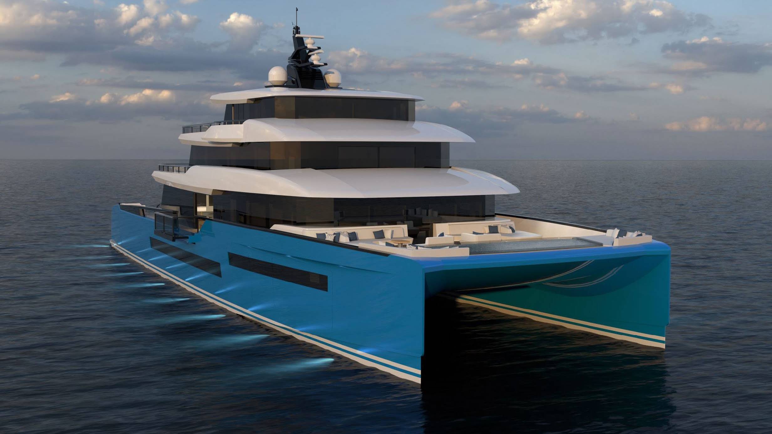 A sleek, multi-level catamaran yacht glides through calm waters under a cloudy sky.