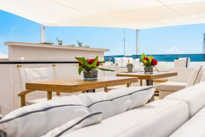 Enjoy refreshing cocktails and stunning ocean views from this luxurious yacht deck.