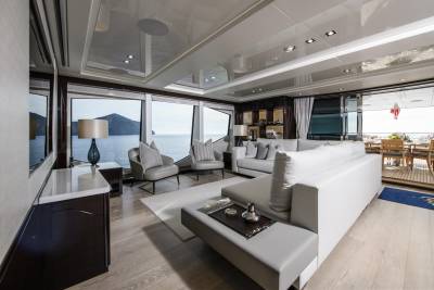 Luxurious yacht interiors blend seamlessly with breathtaking ocean views, offering an unparalleled experience of coastal elegance.