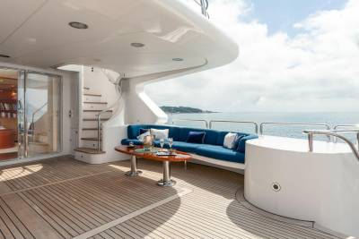 Relax on the spacious deck of this luxurious yacht, enjoying the ocean breeze and stunning coastal views.