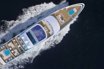 A luxurious yacht glides through dark blue waters, leaving a trail of white foam in its wake.