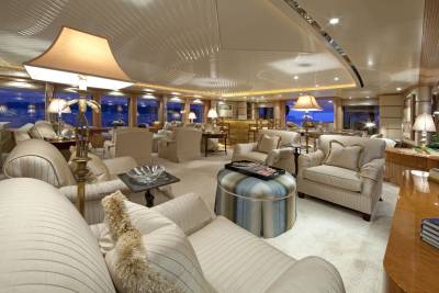 Luxurious yacht interiors offer plush seating and ambient lighting for a sophisticated evening at sea.