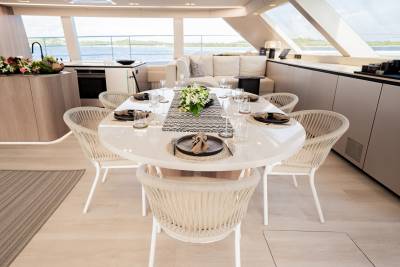 Dine in style aboard this luxurious yacht, surrounded by panoramic ocean views and elegant interior design.