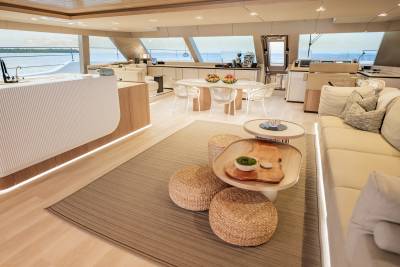 Luxurious yacht interiors offer a serene escape with panoramic ocean views and plush seating.
