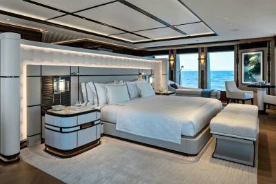 Luxurious yacht stateroom offers unparalleled ocean views and sophisticated comfort for the discerning traveler.