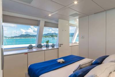Luxurious yacht cabin offers stunning ocean views and a serene, modern retreat.