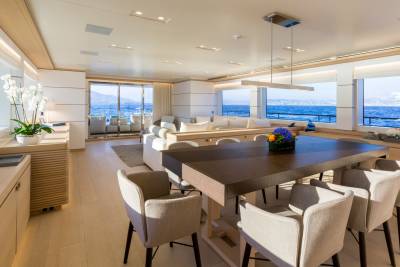 Dine in style aboard this luxurious yacht, surrounded by panoramic ocean views and elegant contemporary furnishings.