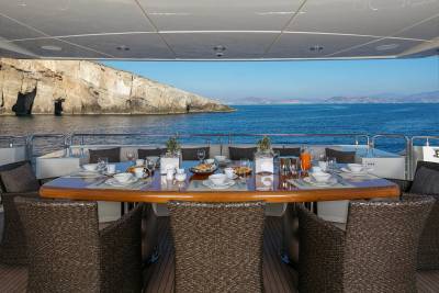 Enjoy a luxurious breakfast on deck with breathtaking views of the Mediterranean coast.