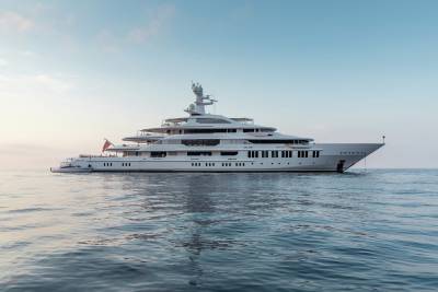 A majestic white superyacht glides serenely across calm, rippling waters under a soft, pastel sky.