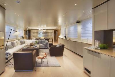 Luxurious yacht interiors offer a serene and stylish retreat with plush seating and elegant design elements.