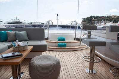 Relax in the onboard jacuzzi surrounded by luxurious seating and stunning views of the harbor.