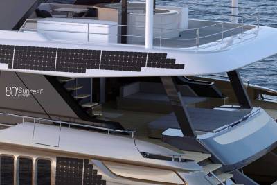This sleek yacht boasts an integrated solar panel system, showcasing a sustainable approach to luxury seafaring.
