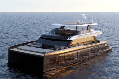 A sleek, modern catamaran yacht glides across calm, blue waters under a bright sky.