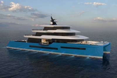 A sleek, multi-level catamaran yacht with a vibrant blue hull glides through calm, dark waters under a cloudy sky.
