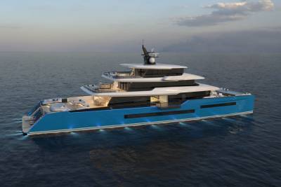 A sleek blue yacht with multiple decks and underwater lights glides across the calm ocean at dusk.