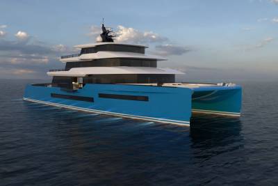 A striking blue catamaran yacht with multiple levels and underwater lights glides across calm, dark blue waters under a cloudy sky.