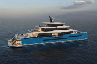 This luxurious blue yacht, illuminated by underwater lights, offers ample deck space for relaxation and entertainment on the open sea.