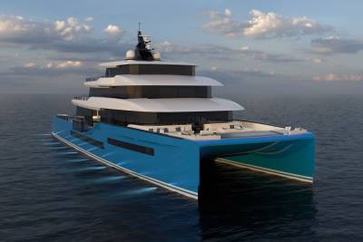 A sleek, modern catamaran yacht glides through calm waters under a cloudy sky, its blue hull illuminated by underwater lights.
