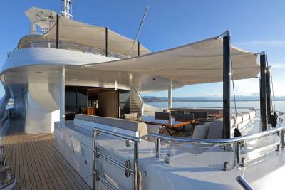 Luxurious yacht decks offer ample space for al fresco dining and lounging with stunning ocean views.