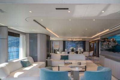 Luxurious yacht interiors offer breathtaking ocean views and elegant seating areas for ultimate relaxation.