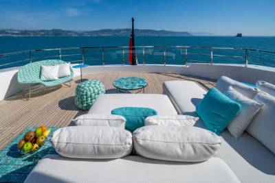 Relax on the spacious deck of this luxury yacht, surrounded by the azure sea and picturesque coastline.