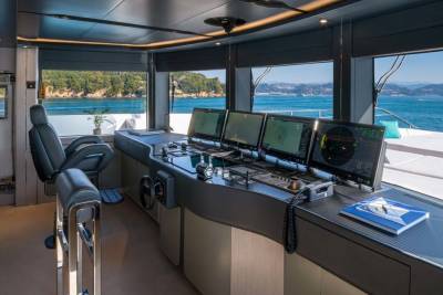 The modern yacht bridge offers panoramic views and advanced navigation systems for a seamless journey.