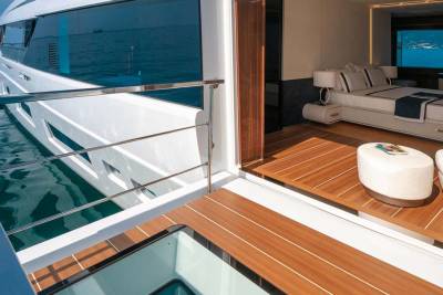 Luxurious yacht interiors seamlessly blend with the open sea, offering a private sanctuary with breathtaking ocean views.