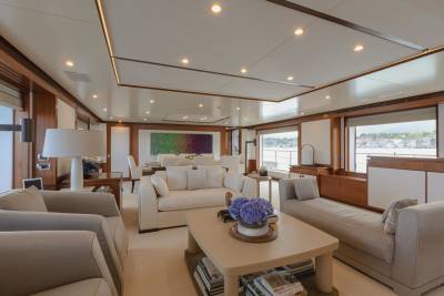 Luxurious yacht interiors offer a serene retreat with plush seating and stunning ocean views.