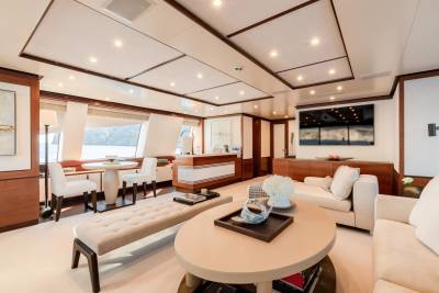 Luxurious yacht interiors offer a serene retreat with elegant furnishings and panoramic views of the water.
