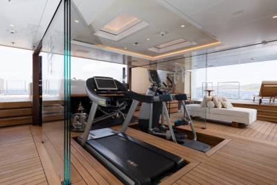 This luxurious yacht gym offers a state-of-the-art workout experience with stunning ocean views.