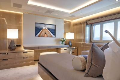 Luxurious yacht interiors offer a serene escape with warm lighting, elegant furnishings, and breathtaking ocean views.