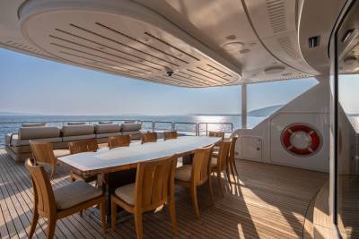 Dine al fresco on the expansive deck of this luxurious yacht, surrounded by the tranquil beauty of the open sea.