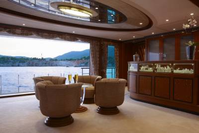 Luxurious yacht interiors offer breathtaking ocean views and elegant seating areas for ultimate relaxation.