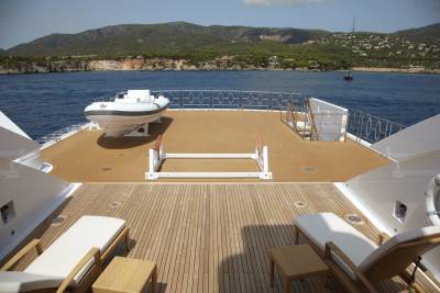 Relax on the spacious deck of this luxury yacht, surrounded by stunning Mediterranean scenery.