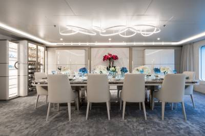 Dine in elegant style aboard this luxury yacht, surrounded by stunning ocean views and exquisite decor.