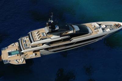 This luxurious yacht features multiple decks with ample seating, a swimming pool, and a sleek design perfect for cruising the open water.