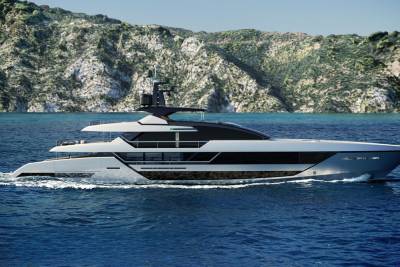 A sleek, modern yacht glides through calm blue waters with a rugged, green-covered mountain range in the background.