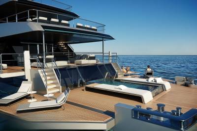 Luxurious yacht deck features a serene pool, sun loungers, and plush seating overlooking the tranquil blue ocean.