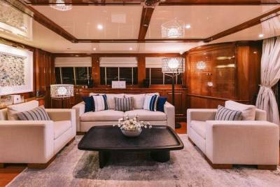 Luxurious yacht interiors feature plush seating and elegant wood accents for ultimate relaxation at sea.