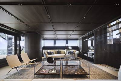 Luxurious yacht interiors offer a serene retreat with expansive windows overlooking the tranquil sea.