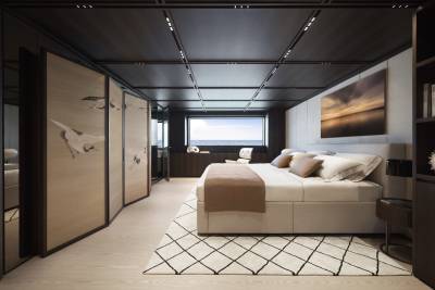 This luxurious yacht bedroom offers serene ocean views and elegant Japanese crane-inspired cabinetry.