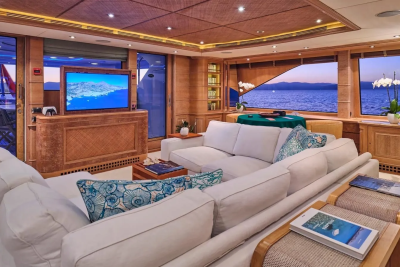 Luxurious yacht interiors offer a serene escape with stunning ocean views and comfortable seating.