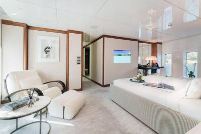 Luxurious yacht interiors offer a serene retreat with elegant furnishings and stunning ocean views.