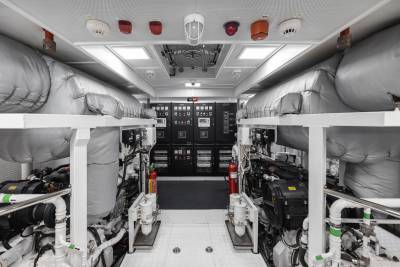 The interior of a vehicle, likely an ambulance or emergency response unit, with various medical equipment and supplies visible throughout the space.