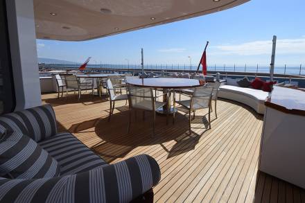Relax on the spacious deck of this luxury yacht, enjoying the ocean breeze and panoramic views.