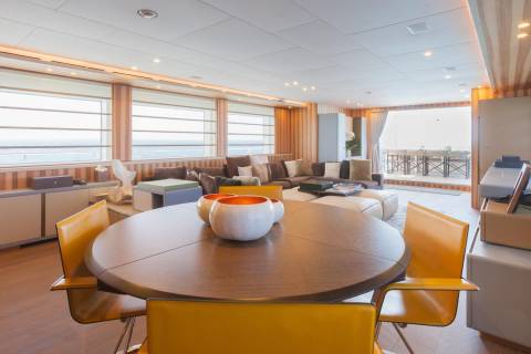 Dine in style on this luxurious yacht's spacious dining area with panoramic ocean views.