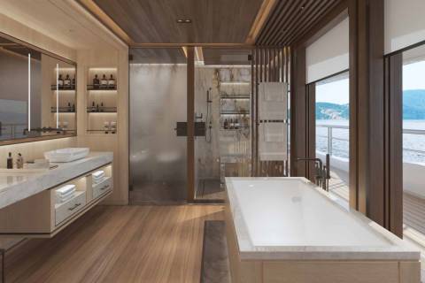 Luxurious yacht bathroom with a freestanding tub and shower offers stunning ocean views.