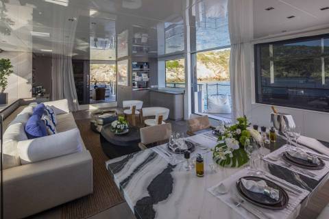 Elegant dining is set for a seaside feast on this luxurious yacht's main salon.