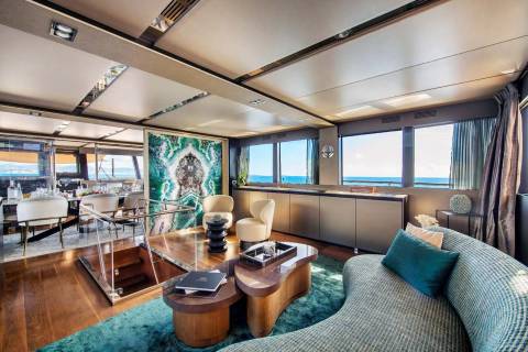 Luxurious yacht interiors blend modern design with breathtaking ocean views.