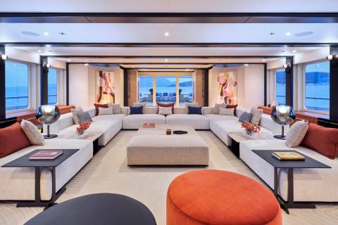 Luxurious yacht interiors offer a serene retreat with expansive views of the tranquil sea.